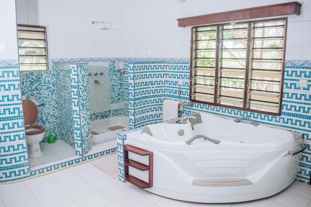 Kijani Cottages Diani Diani Beach Kültér fotó