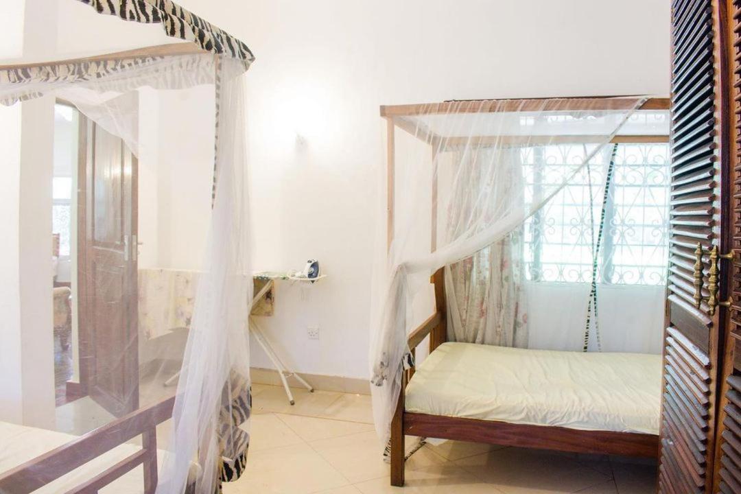 Kijani Cottages Diani Diani Beach Kültér fotó