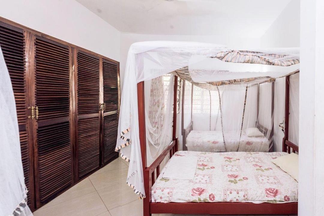 Kijani Cottages Diani Diani Beach Kültér fotó