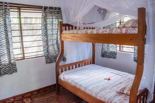 Kijani Cottages Diani Diani Beach Kültér fotó