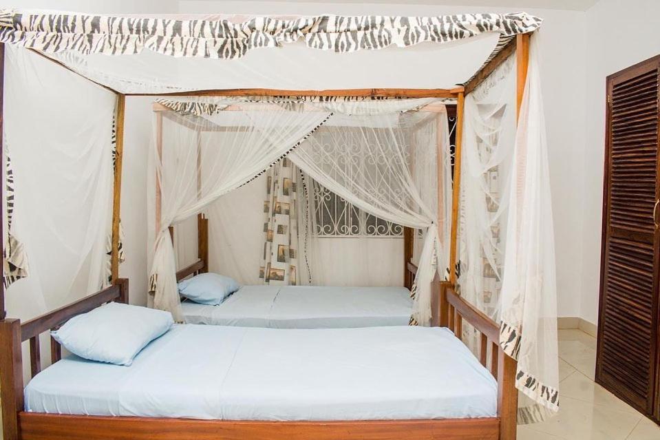 Kijani Cottages Diani Diani Beach Kültér fotó